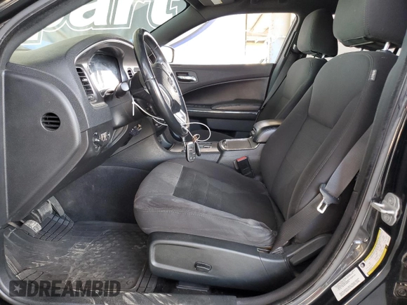 2013 Dodge Charger SE with VIN 2C3CDXBG9DH514410, listed as a Copart auction lot 54234975 with 85,359 mi miles and Salvage Title. Bid and sale history available at DreamBid. Image 7.