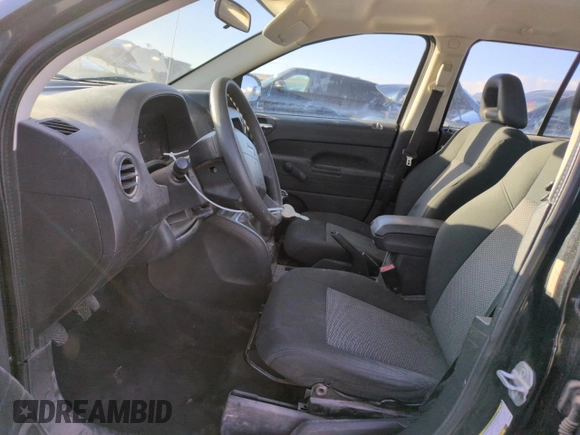 2009 Jeep Compass North with VIN 1J4FT47B89D189562, listed as a Copart auction lot 48285415 with 89,377 mi miles and Salvage Title. Bid and sale history available at carsss.com. Image 7.
