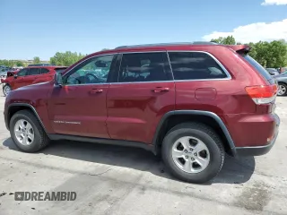 2016 Jeep Grand Cherokee Laredo with VIN 1C4RJFAG8GC413490, listed as a Copart auction lot 62347445 with 104,056 mi miles and Salvage title. Bid and sale history available at DreamBid. Image 2.