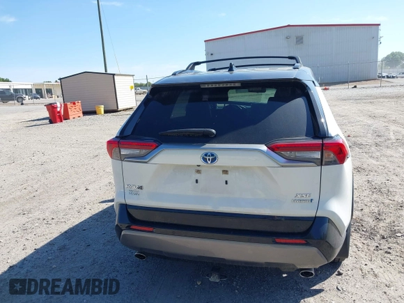 2021 Toyota RAV4 Hybrid XSE with VIN JTME6RFV4MJ008825, listed as a IAAI auction lot 42060148 with 91,129 mi miles and . Bid and sale history available at DreamBid. Image 16.