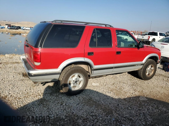 1995 Chevrolet Blazer z VIN 1GNDT13W4S2243226, wystawiony jako Copart lot #81429904 z przebiegiem 1 757 497 mil mil oraz Szkoda całkowita • Salvage title. Historia ofert i sprzedaży dostępna na DreamBid. Obrazek 3.