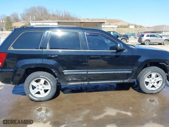 2007 Jeep Grand Cherokee Laredo with VIN 1J8GR48K67C523705, listed as a IAAI auction lot 41774281 with 215,572 mi miles. Bid and sale history available at carsss.com. Image 14.