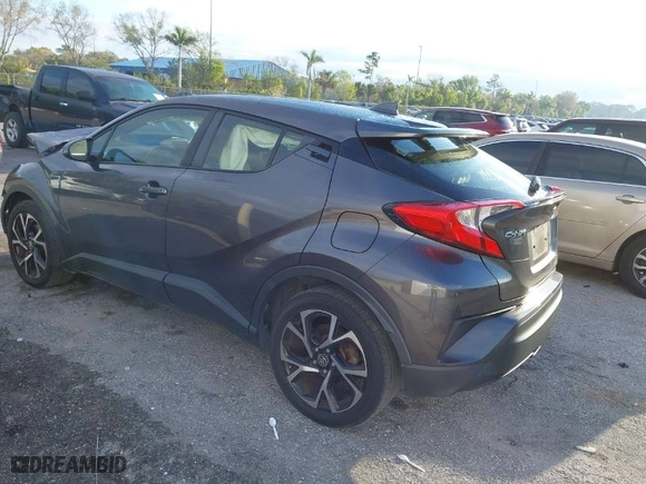 2020 Toyota C-HR LE with VIN JTNKHMBXXL1087676, listed as a IAAI auction lot 41662260 with 68,870 mi miles. Bid and sale history available at carsss.com. Image 3.