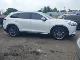 2019 Mazda CX-9 Signature with VIN JM3TCBEY8K0327724, listed as a IAAI auction lot 42068769 with 77,823 mi miles and . Bid and sale history available at DreamBid. Image 13.