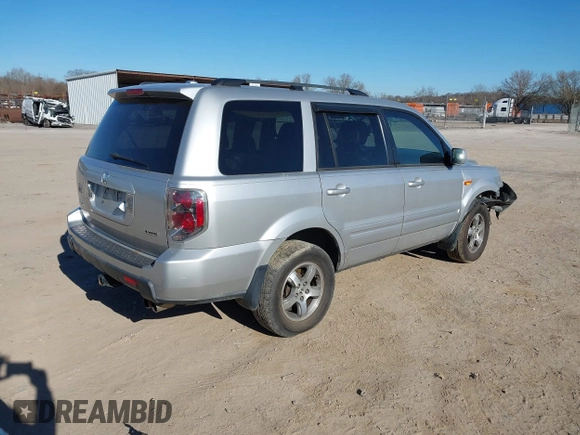 2006 Honda Pilot EX-L with VIN 5FNYF18786B030253, listed as a IAAI auction lot 41708620 with 146,713 mi miles and . Bid and sale history available at DreamBid. Image 4.