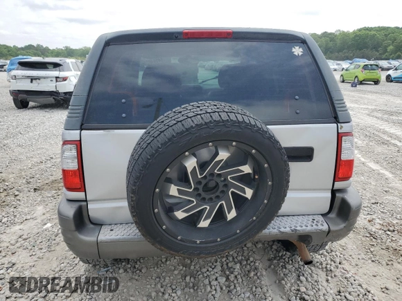 2002 Isuzu Rodeo z VIN 4S2CK57W324328043, wystawiony jako Copart lot #54584025 z przebiegiem 141 523 mil mil oraz Szkody całkowita. Historia ofert i sprzedaży dostępna na DreamBid. Obrazek 6.