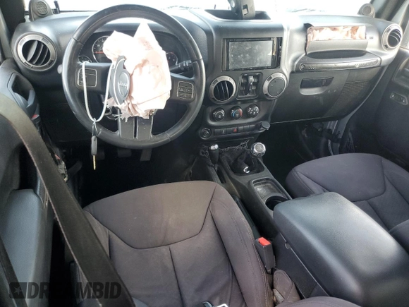 2013 Jeep Wrangler Unlimited Sport z VIN 1C4BJWDG7DL597491, wystawiony jako Copart lot #50719435 z przebiegiem Nie podano mil oraz Szkoda całkowita • Salvage title. Historia ofert i sprzedaży dostępna na DreamBid. Obrazek 8.