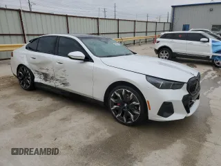 2024 BMW 5 Series 530i with VIN WBA43FJ09RCS08705, listed as a Copart auction lot 42008855 with 7,993 mi miles and Salvage Title. Bid and sale history available at carsss.com. Image 4.