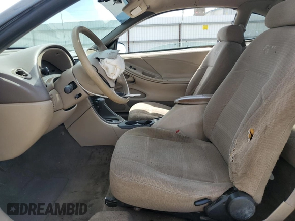 1999 Ford Mustang z VIN 1FAFP4041XF140264, wystawiony jako Copart lot #54801555 z przebiegiem 156 514 mil mil oraz Szkoda całkowita • Salvage title. Historia ofert i sprzedaży dostępna na DreamBid. Obrazek 7.