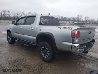 2022 Toyota Tacoma 4WD SR with VIN 3TMCZ5AN9NM504870, listed as a IAAI auction lot 41635029 with 28,361 mi miles. Bid and sale history available at carsss.com. Image 3.