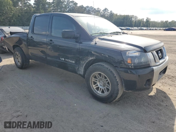 2011 Nissan Titan SV with VIN 1N6BA0ED1BN311392, listed as a Copart auction lot 72947264 with 132,069 mi miles and Salvage Title. Bid and sale history available at DreamBid. Image 4.