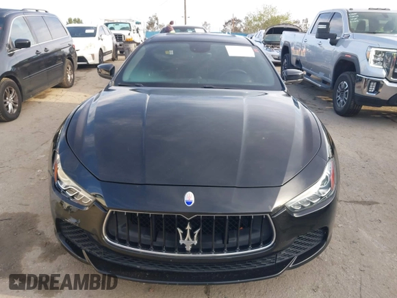 2017 Maserati Ghibli with VIN ZAM57XSA5H1196437, listed as a IAAI auction lot 41814688 with 63,334 mi miles. Bid and sale history available at carsss.com. Image 12.