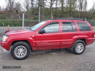 2004 Jeep Grand Cherokee Limited with VIN 1J4GW58S94C299311, listed as a IAAI auction lot 41912467 with 55,736 mi miles. Bid and sale history available at carsss.com. Image 14.