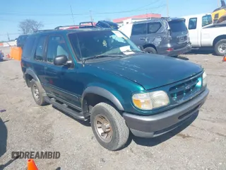 1998 Ford Explorer Sport z VIN 1FMYU22X7WUC36106, wystawiony jako IAAI lot #41957820 z przebiegiem 163 881 mil mil oraz . Historia ofert i sprzedaży dostępna na DreamBid. Obrazek 1.