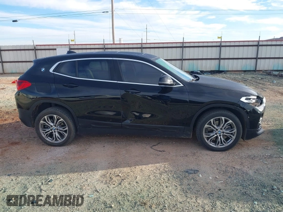 2020 BMW X2 xDrive28i with VIN WBXYJ1C02L5P31038, listed as a IAAI auction lot 41338219 with 72,854 mi miles. Bid and sale history available at carsss.com. Image 13.