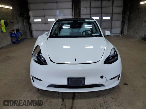 2023 Tesla Model Y Performance z VIN 7SAYGDEF6PF798103, wystawiony jako Copart lot #53607895 z przebiegiem 22 334 mil mil oraz Szkoda całkowita • Salvage title. Historia ofert i sprzedaży dostępna na DreamBid. Obrazek 5.