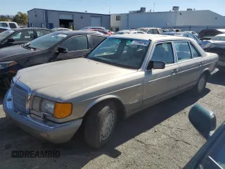 1988 Mercedes-Benz 560 with VIN WDBCA39D7JA400066, listed as a Copart auction lot 73396074 with 178,343 mi miles and Clean Title. Bid and sale history available at DreamBid. Image 1.