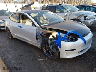 2023 Tesla Model 3 with VIN 5YJ3E1EAXPF584537, listed as a IAAI auction lot 41464243 with 33,229 mi miles. Bid and sale history available at carsss.com. Image 1.