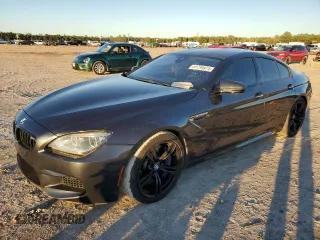 2015 BMW M6 z VIN WBS6C9C52FD468030, wystawiony jako Copart lot #81739974 z przebiegiem 66 861 mil mil oraz Szkody całkowita. Historia ofert i sprzedaży dostępna na DreamBid. Obrazek 1.