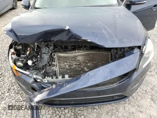 2015 Volvo S60 T5 Drive-E Platinum z VIN YV140MFD8F1313748, wystawiony jako Copart lot #57789415 z przebiegiem 144 185 mil mil oraz Szkoda całkowita • Salvage title. Historia ofert i sprzedaży dostępna na DreamBid. Obrazek 11.