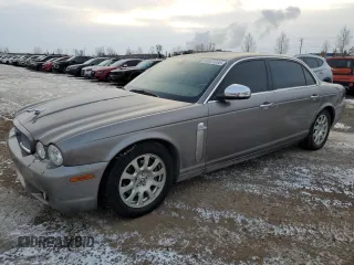 2009 Jaguar XJ with VIN SAJXA82B69SH31532, listed as a Copart auction lot 88027035 with 90,233 mi miles and Clean Title. Bid and sale history available at DreamBid. Image 1.