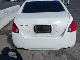 2005 Nissan Maxima 3.5 SL with VIN 1N4BA41E65C843333, listed as a IAAI auction lot 41693064 with 221,240 mi miles. Bid and sale history available at carsss.com. Image 14.