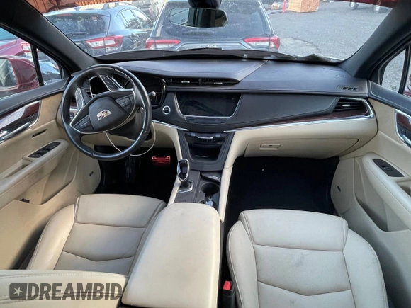 2019 Cadillac XT5 Premium Luxury AWD z VIN 1GYKNFRS2KZ251595, wystawiony jako Copart lot #45811055 z przebiegiem 23 925 mil mil oraz Szkoda całkowita • Salvage title. Historia ofert i sprzedaży dostępna na DreamBid. Obrazek 9.