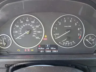 2013 BMW 3 Series 328i with VIN WBA3C1G55DNR49447, listed as a IAAI auction lot 41296098 with 126,605 mi miles and . Bid and sale history available at DreamBid. Image 7.