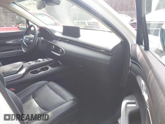 2022 Genesis GV70 2.5T with VIN KMUMADTB5NU068987, listed as a IAAI auction lot 41596194 with 34,123 mi miles and . Bid and sale history available at DreamBid. Image 5.