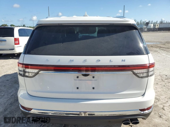 2020 Lincoln Aviator Reserve z VIN 5LM5J7WCXLGL10805, wystawiony jako Copart lot #56521375 z przebiegiem 53 729 mil mil oraz Szkoda całkowita • Salvage title. Historia ofert i sprzedaży dostępna na DreamBid. Obrazek 6.