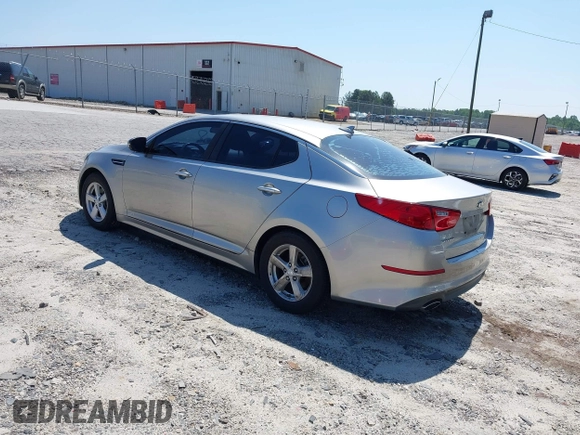 2014 Kia Optima LX with VIN KNAGM4A79E5470198, listed as a IAAI auction lot 42142484 with 169,140 mi miles. Bid and sale history available at carsss.com. Image 3.