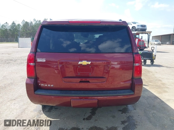 2019 Chevrolet Tahoe LT z VIN 1GNSCBKC9KR102552, wystawiony jako IAAI lot #41792517 z przebiegiem 92 856 mil mil oraz . Historia ofert i sprzedaży dostępna na DreamBid. Obrazek 16.