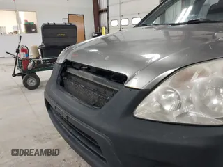 2006 Honda CR-V LX with VIN JHLRD785X6C053853, listed as a IAAI auction lot 42018895 with 246,316 mi miles and . Bid and sale history available at carsss.com. Image 16.