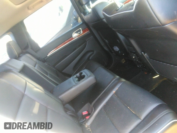2011 Jeep Grand Cherokee Overland with VIN 1J4RS6GT2BC524217, listed as a IAAI auction lot 41827844 with 33,442 mi miles and . Bid and sale history available at DreamBid. Image 8.