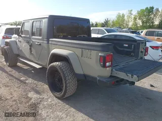 2020 Jeep Gladiator Sport S with VIN 1C6HJTAG3LL214469, listed as a IAAI auction lot 42017170 with 114,599 mi miles. Bid and sale history available at carsss.com. Image 3.