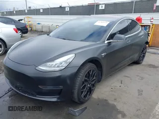 2018 Tesla Model 3 Long Range Battery with VIN 5YJ3E1EA7JF012249, listed as a IAAI auction lot 41782972 with 103,412 mi miles. Bid and sale history available at carsss.com. Image 18.