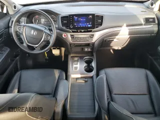 2023 Honda Ridgeline RTL with VIN 5FPYK3F52PB023574, listed as a Copart auction lot 44419565 with 15,205 mi miles and Salvage title. Bid and sale history available at DreamBid. Image 8.