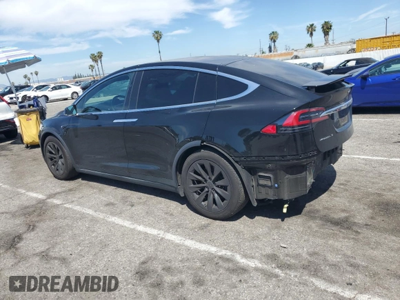 2017 Tesla Model X 90D with VIN 5YJXCBE20HF051099, listed as a Copart auction lot 52208205 with 118,828 mi miles and Salvage Title. Bid and sale history available at DreamBid. Image 2.