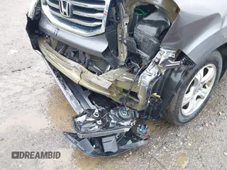 2015 Honda Pilot EX-L with VIN 5FNYF4H51FB064583, listed as a IAAI auction lot 41977746 with 120,398 mi miles and . Bid and sale history available at carsss.com. Image 19.