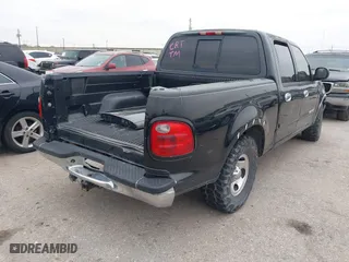 2001 Ford F-150 SuperCrew XLT with VIN 1FTRW07W51KD86453, listed as a IAAI auction lot 41314646 with 1 mi miles. Bid and sale history available at carsss.com. Image 4.