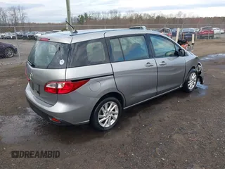 2012 Mazda 5 Sport with VIN JM1CW2BLXC0107933, listed as a IAAI auction lot 41813231 with 164,395 mi miles and . Bid and sale history available at DreamBid. Image 4.