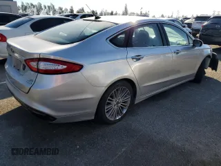 2013 Ford Fusion SE with VIN 3FA6P0H9XDR297802, listed as a Copart auction lot 88169155 with 184,447 mi miles and Salvage title. Bid and sale history available at DreamBid. Image 3.