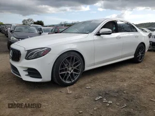 2018 Mercedes-Benz E 300 with VIN WDDZF4JB2JA329815, listed as a Copart auction lot 50950665 with 61,543 mi miles and Salvage Title. Bid and sale history available at DreamBid. Image 1.
