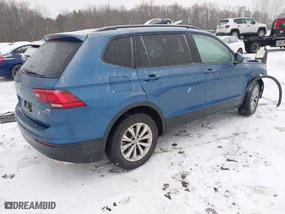 2018 Volkswagen Tiguan S with VIN 3VV0B7AX8JM081263, listed as a IAAI auction lot 41245308 with 58,778 mi miles. Bid and sale history available at carsss.com. Image 4.