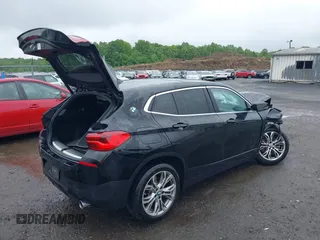 2020 BMW X2 sDrive28i z VIN WBXYH9C01L5P36225, wystawiony jako IAAI lot #39421264 z przebiegiem 70 043 mil mil oraz . Historia ofert i sprzedaży dostępna na DreamBid. Obrazek 4.