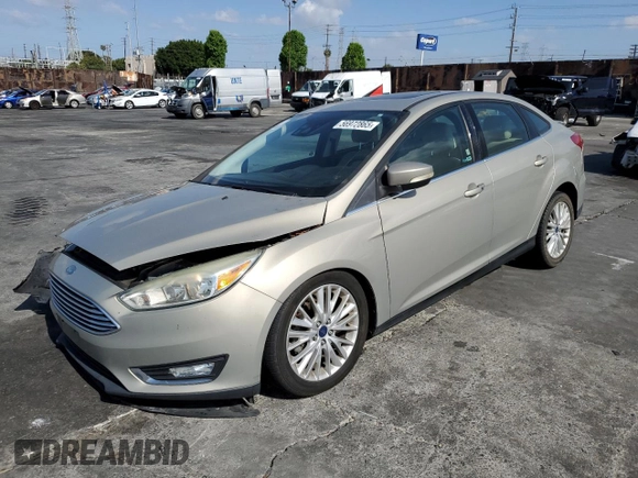 2015 Ford Focus Titanium с VIN 1FADP3J28FL288037, выставлен на аукционе Copart как лот 56972865 с пробегом 75 703 миль миль и Списание • Salvage title. История ставок и продаж доступна на DreamBid. Изображение 1.