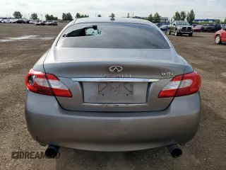 2011 Infiniti M with VIN JN1BY1ARXBM370844, listed as a Copart auction lot 62425515 with 277,315 mi miles and Salvage title. Bid and sale history available at DreamBid. Image 6.