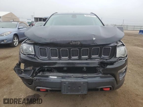 2018 Jeep Compass Trailhawk with VIN 3C4NJDDB6JT207289, listed as a Copart auction lot 56013675 with 83,385 mi miles and Salvage title. Bid and sale history available at DreamBid. Image 5.