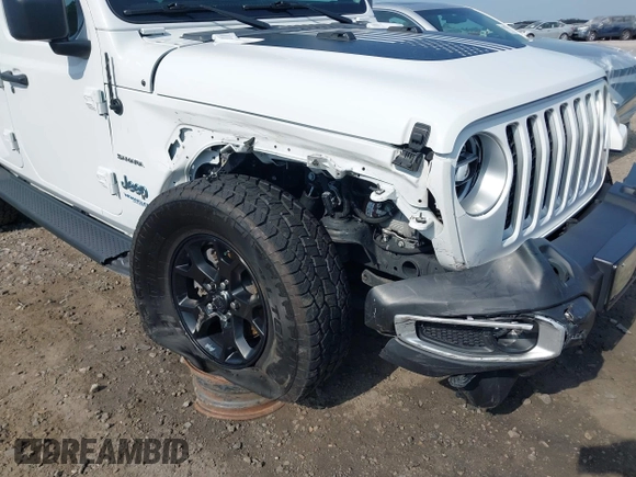 2021 Jeep Wrangler Unlimited Sahara z VIN 1C4JJXP6XMW840844, wystawiony jako IAAI lot #42152271 z przebiegiem 68 209 mil mil oraz . Historia ofert i sprzedaży dostępna na DreamBid. Obrazek 6.