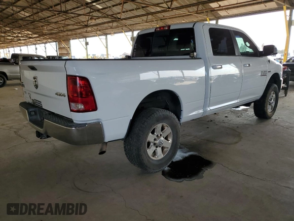 2014 Ram 2500 SLT with VIN 3C6TR5DT0EG309756, listed as a Copart auction lot 51149685 with 163,472 mi miles and Salvage title. Bid and sale history available at DreamBid. Image 3.